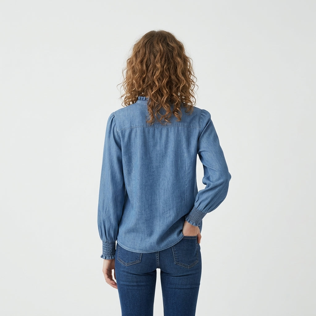 Blau bestickte Bluse